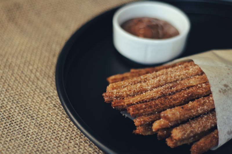 Churros dessert with chocolate sauce